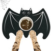 A black bat-shaped Halloween pet feeding mat with a spider web design and cat paws underneath.
