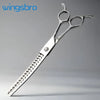 Silver professional pet grooming scissors with serrated blades and hinged handles