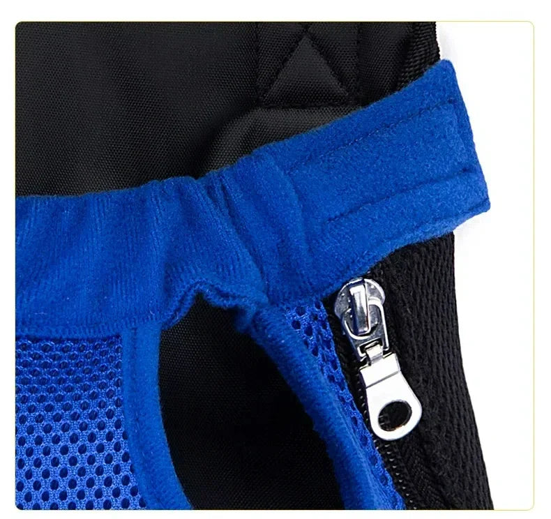 Close-up of a blue breathable mesh pet carrier backpack with black and blue fabric details.