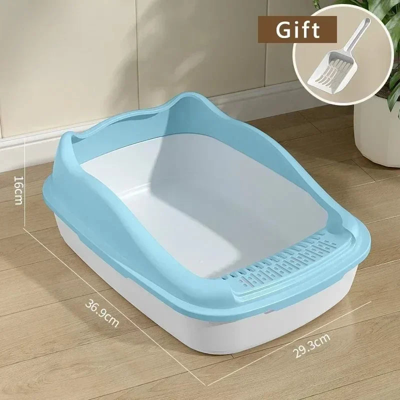 Arenero compacto de bordes altos para gatos