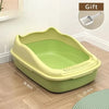 Arenero compacto de bordes altos para gatos