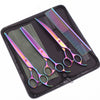 A black case holding a pair of professional stainless steel pet grooming scissors with a rainbow gradient handle.