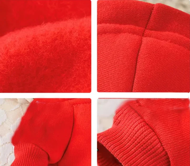 Close-up view of a bright red plush winter hoodie fabric showing texture and stitching.