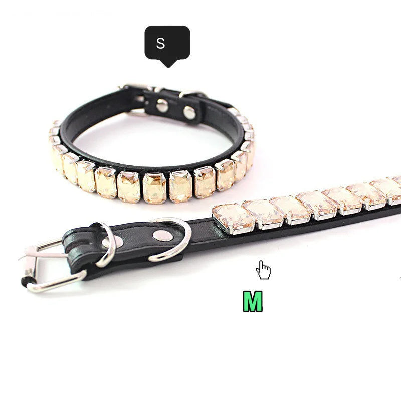 A black leather dog collar adorned with glittering rhinestones and crystal accents.