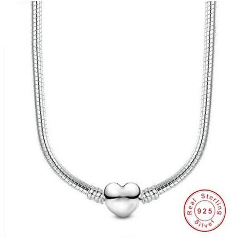 Sterling silver snake chain necklace featuring a heart charm