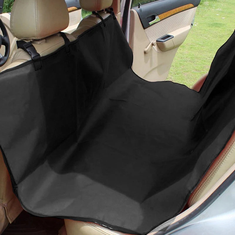 Black waterproof dog car seat hammock installed in a vehicle interior.
