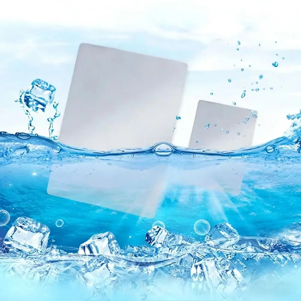 A white aluminum pet cooling plate is shown submerged in clear blue water with ice cubes and bubbles.