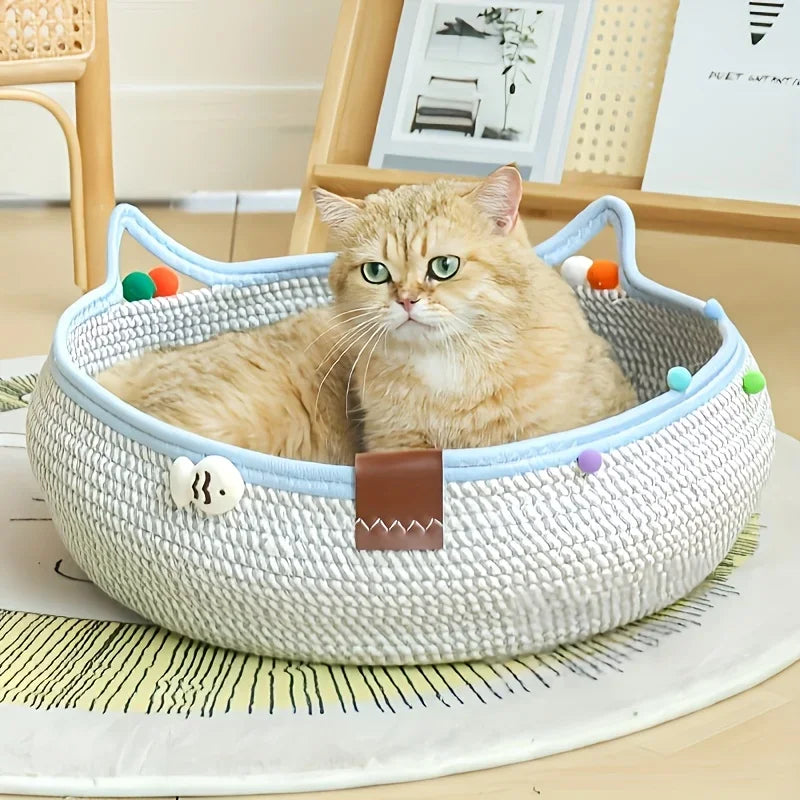 A fluffy orange tabby cat is relaxing in a woven cat scratcher and comfort bed filled with colorful play balls.