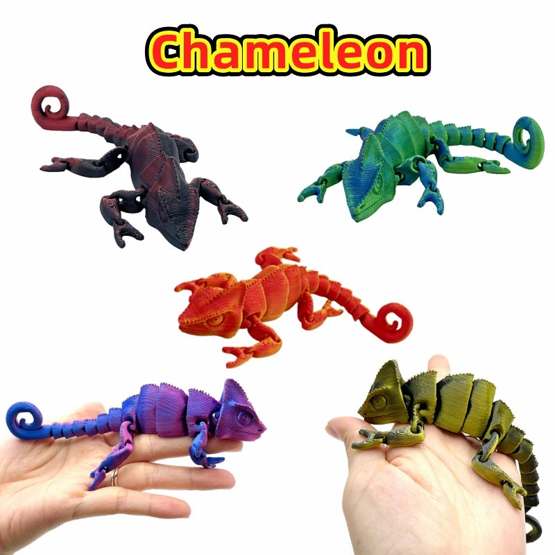 A set of three 3D printed reptile figurines, including a lizard, chameleon, and crocodile, displayed in a hand.