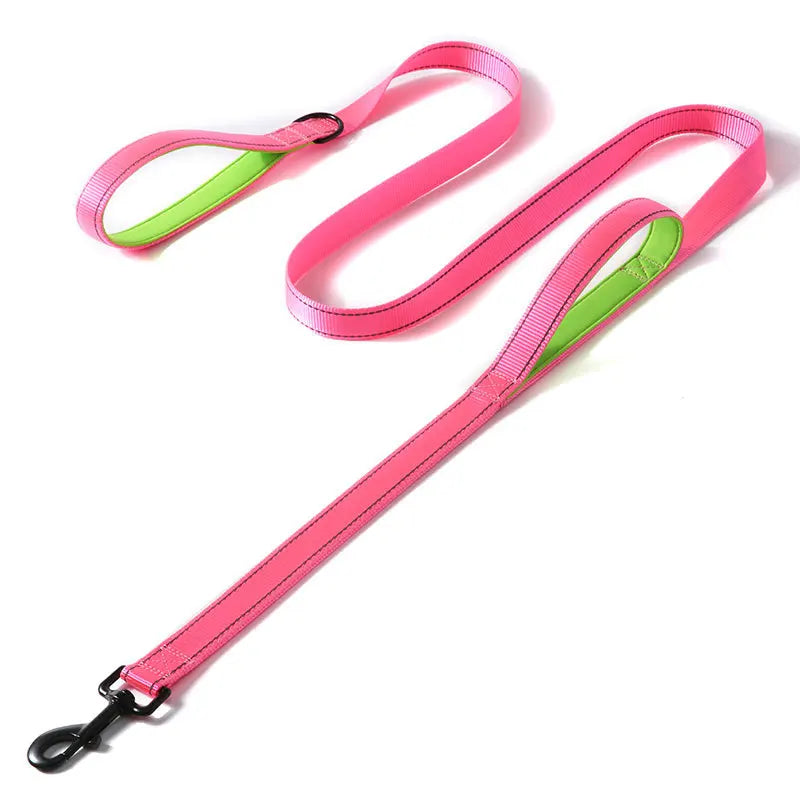 A bright pink heavy duty reflective dog leash with dual handles and a lime green accent.