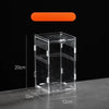A transparent acrylic reptile terrarium with an orange light fixture, shown on a dark surface.