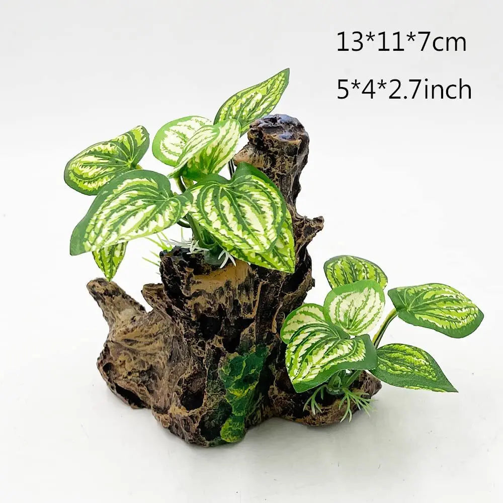A set of realistic plastic aquarium plants with secure bases, featuring green and white patterned leaves.