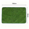 A rectangular green artificial dog grass mat measuring 100cm by 50cm.