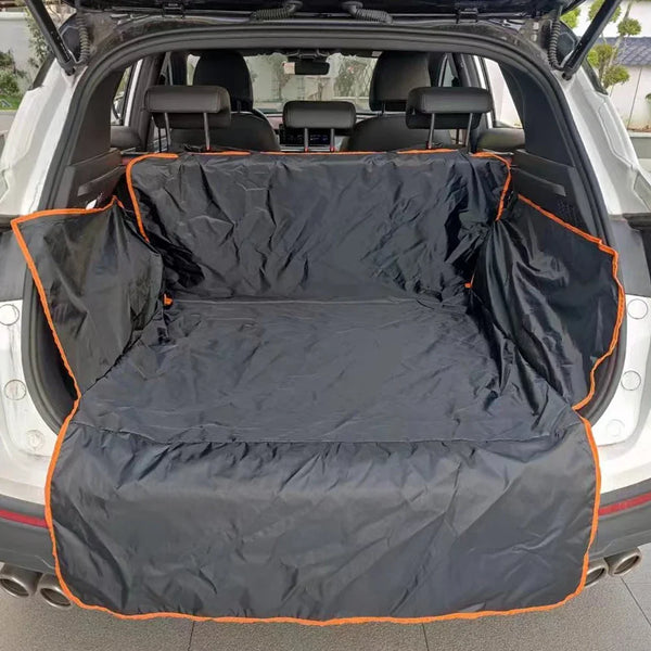 Black waterproof cargo liner for a dog in a white SUV with the rear hatch open