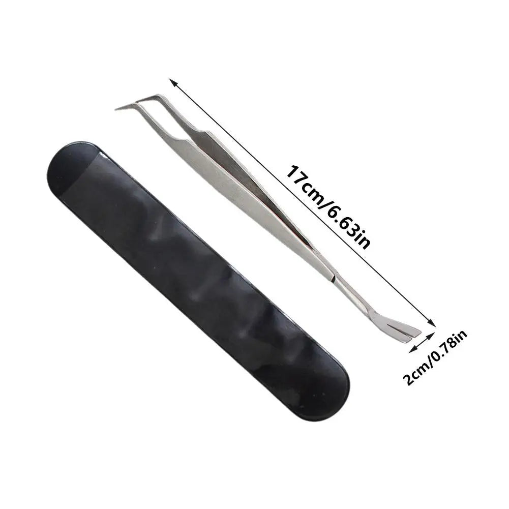 A black precision tick and flea remover tool with a stainless steel needle, shown against a white background.
