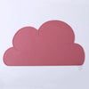 A pink, cloud-shaped silicone pet feeding mat.