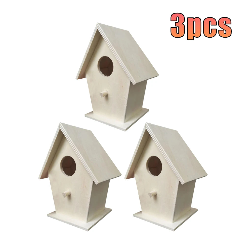 Three white wooden wall-mounted bird houses shown from the front.