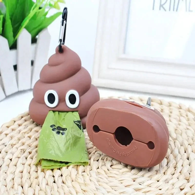 A brown silicone dog waste bag dispenser shaped like a dog head with large eyes and a green bag resting on a woven mat.