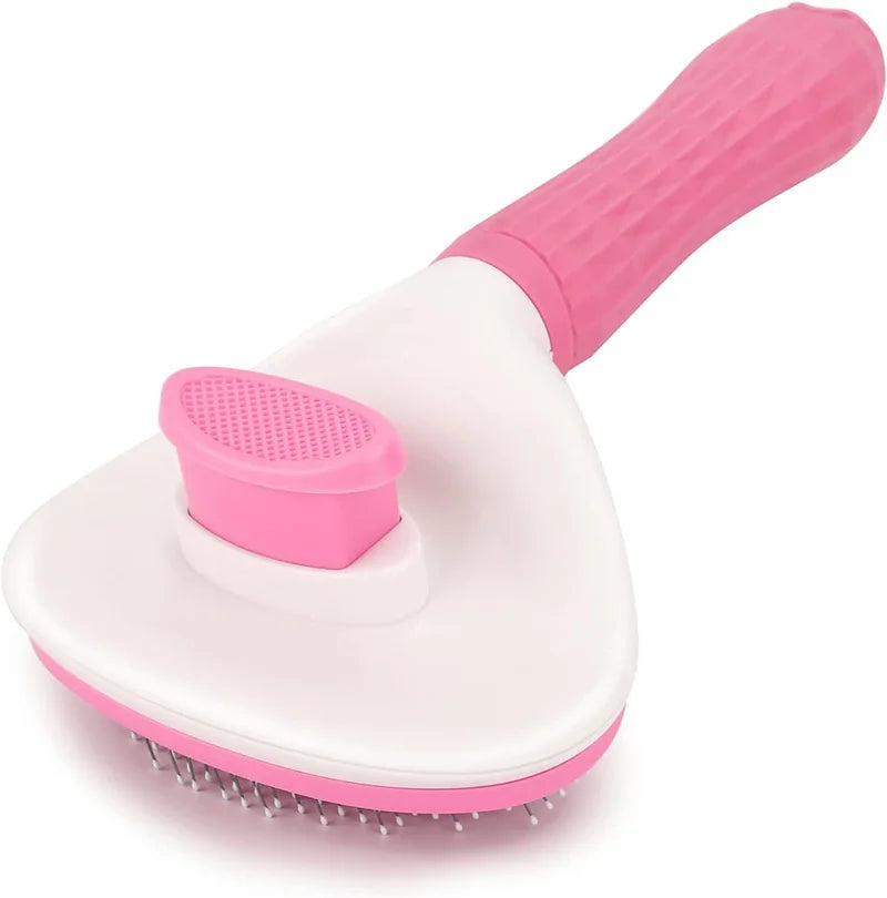 A pink self-cleaning pet grooming brush with a white head and pink handle.