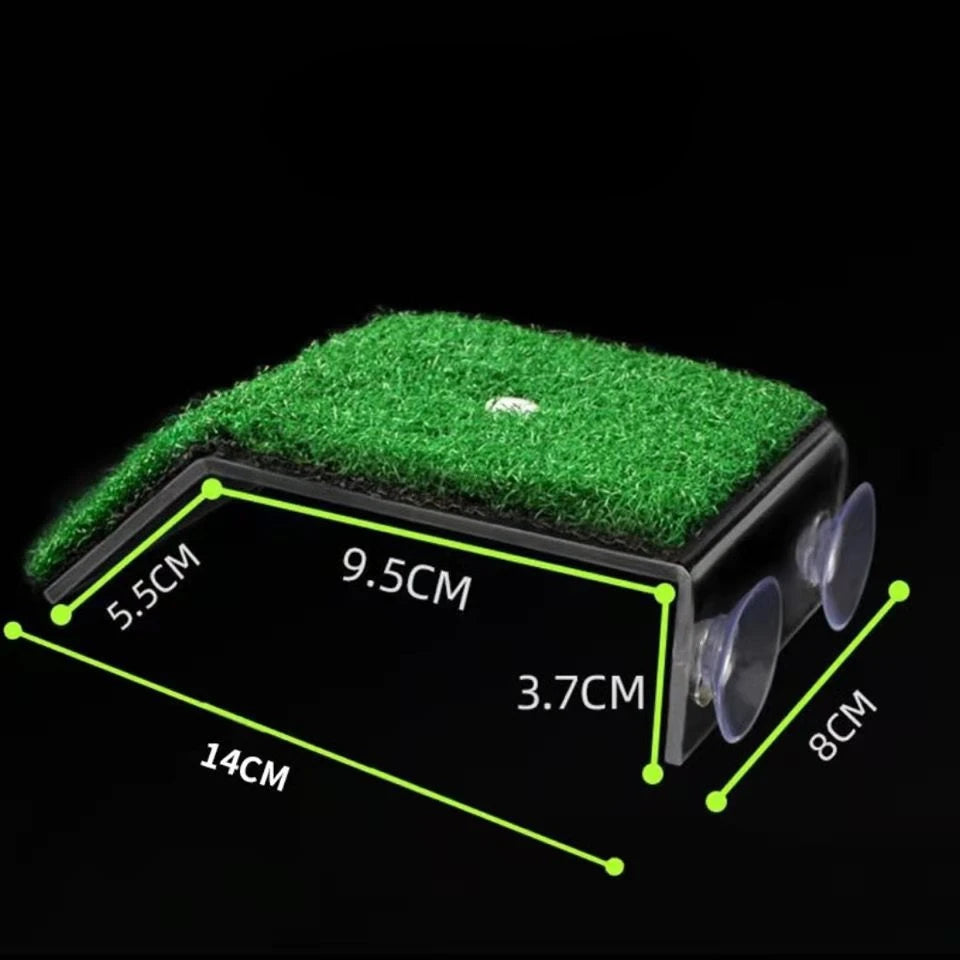 A green grass ramp platform with suction cups and dimensions shown on a black background.