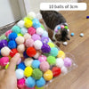 A clear bag filled with ten colorful plush balls of 3cm for cats
