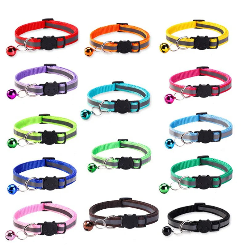 A collection of various safety breakaway cat collars and necklaces in black, orange, yellow, purple, and silver.