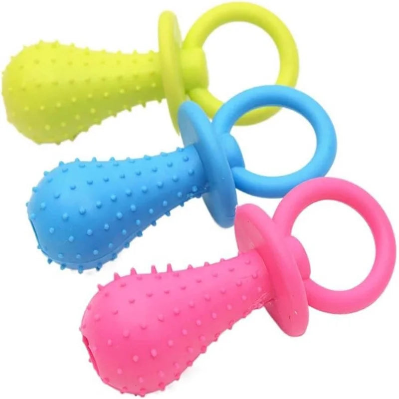 A set of colorful rubber pacifier chew toys in yellow, blue, and pink with a dental cleaning texture.