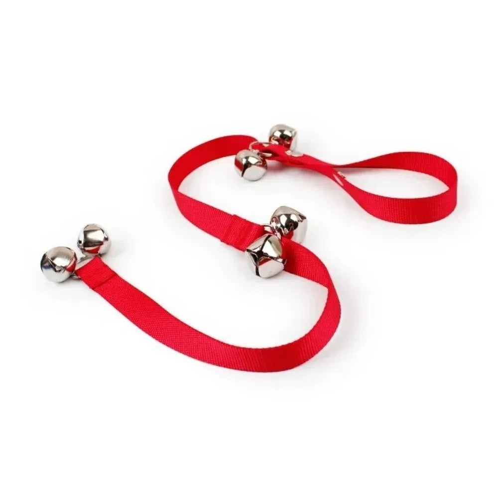 Red adjustable metal dog doorbell with attached strap and bell for potty training