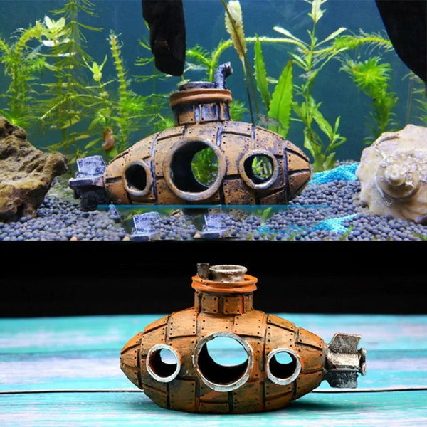 A detailed resin submarine wreck ornament is displayed on a wooden surface.