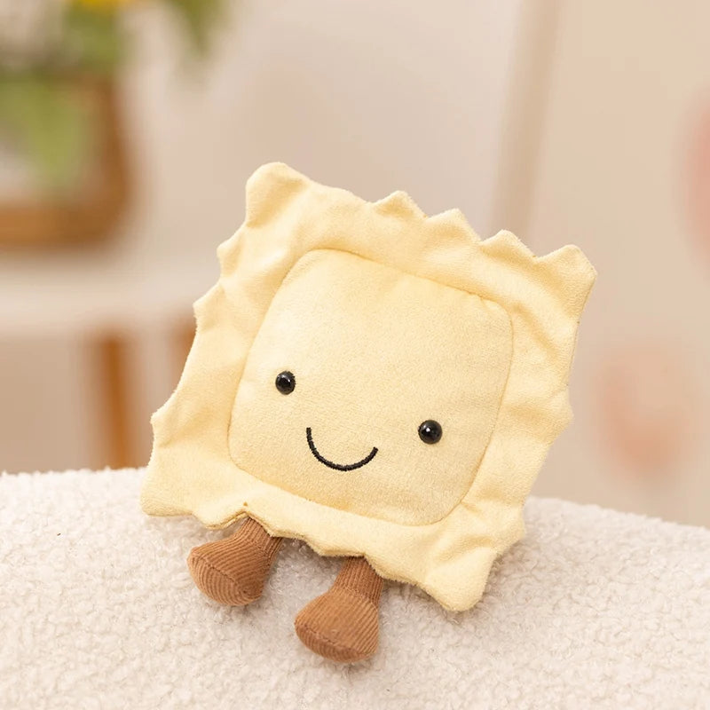 A cute, light yellow plush toy shaped like a slice of pie with brown legs.