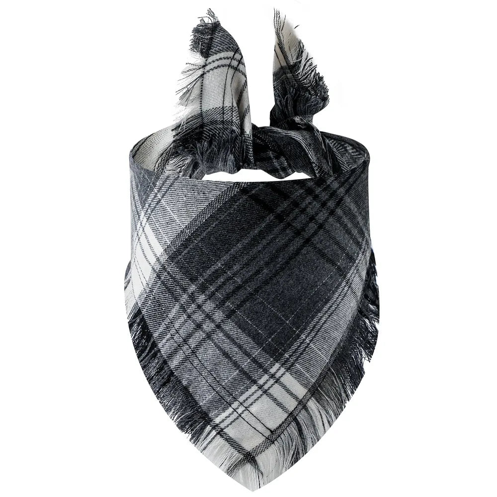 A black and gray buffalo plaid bandana with fringed edges.