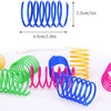 Colorful spring toys in various colors like blue, green, and pink are shown coiled for play.