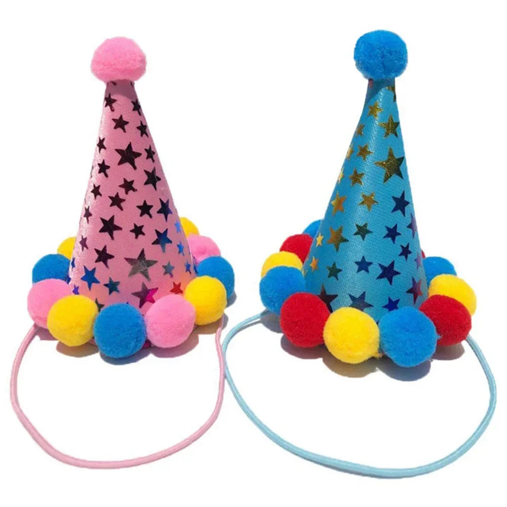 A pink sequin party cone hat with yellow and blue pom-poms and a blue sequin party hat with yellow and red pom-poms
