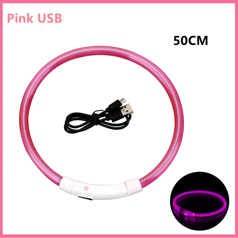Pink USB rechargeable pet safety light collar with a flexible silicone band and a connector.