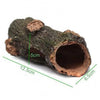 A piece of hollowed wood resin tree branch used as an aquarium ornament, showing its dimensions.