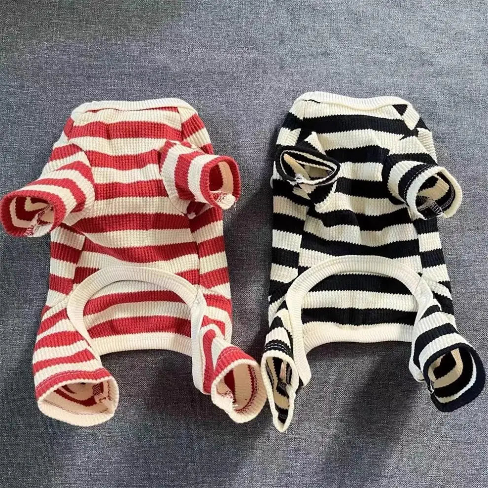 A cozy striped dog sweater featuring red and white horizontal stripes for autumn and winter.