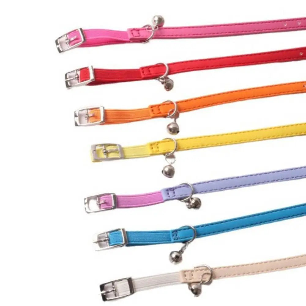 A collection of colorful adjustable cat collars made of soft PU leather and elastic webbing.
