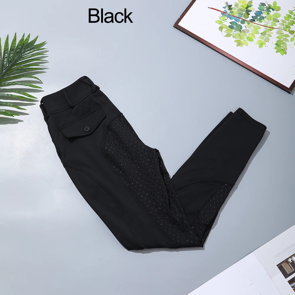 Black women's full-seat riding breeches displayed on a light gray surface.