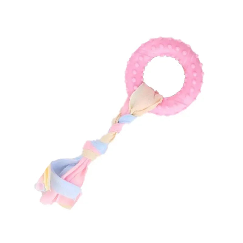 Pink and blue braided dog chew toy ring with a pink and beige fabric tie