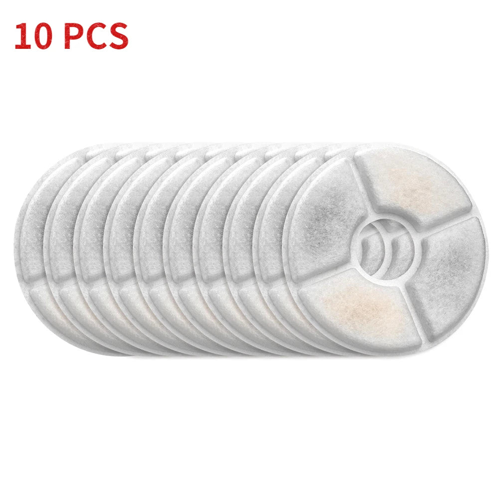 Ten replacement filters for pet water fountains, stacked in a row.