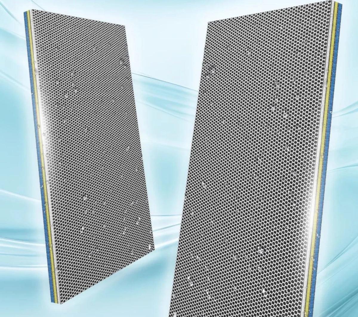 Two rectangular aquarium sponge filter media pieces with a perforated surface and blue trim.