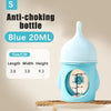 A light blue silicone pet nursing bottle with an anti-choking valve is shown against a neutral background.