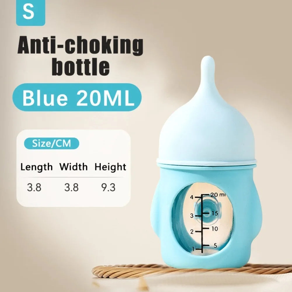 A light blue silicone pet nursing bottle with an anti-choking valve is shown against a neutral background.