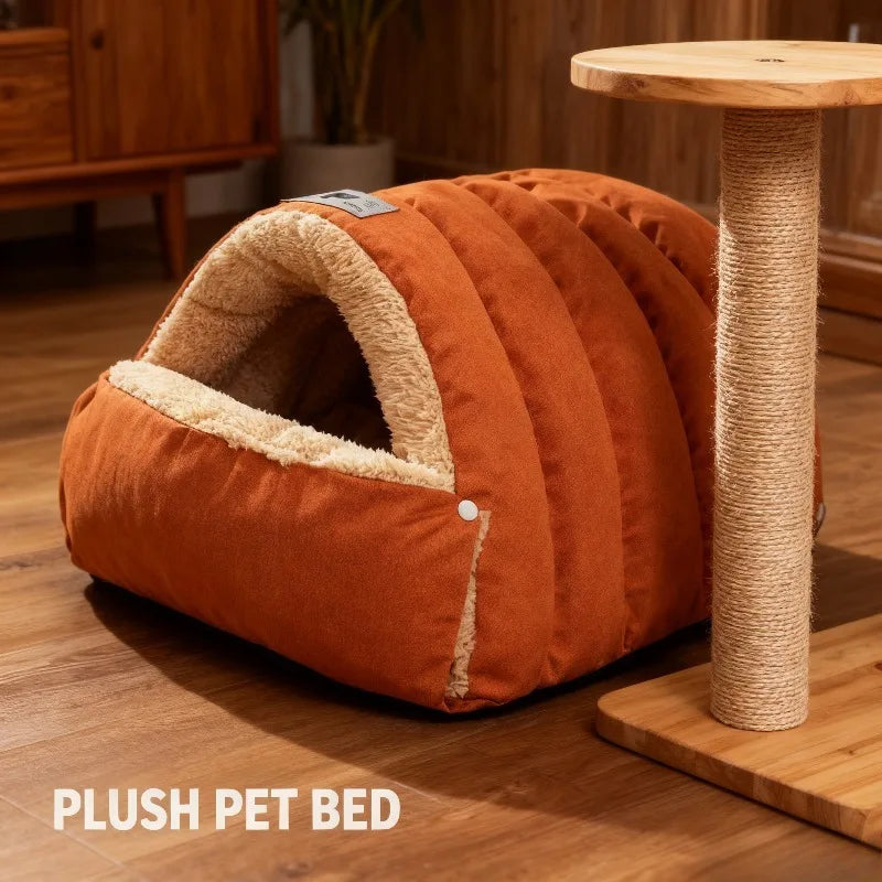 An orange plush pet bed with a light brown trim sits on a wooden stand.