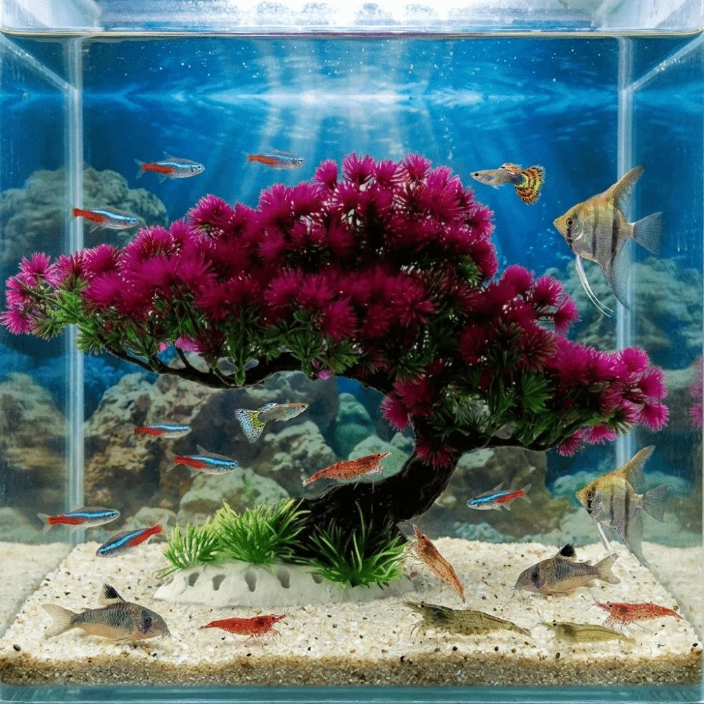 Lifelike artificial aquarium plant shaped like a vibrant pink and purple pine tree in an aquatic environment.