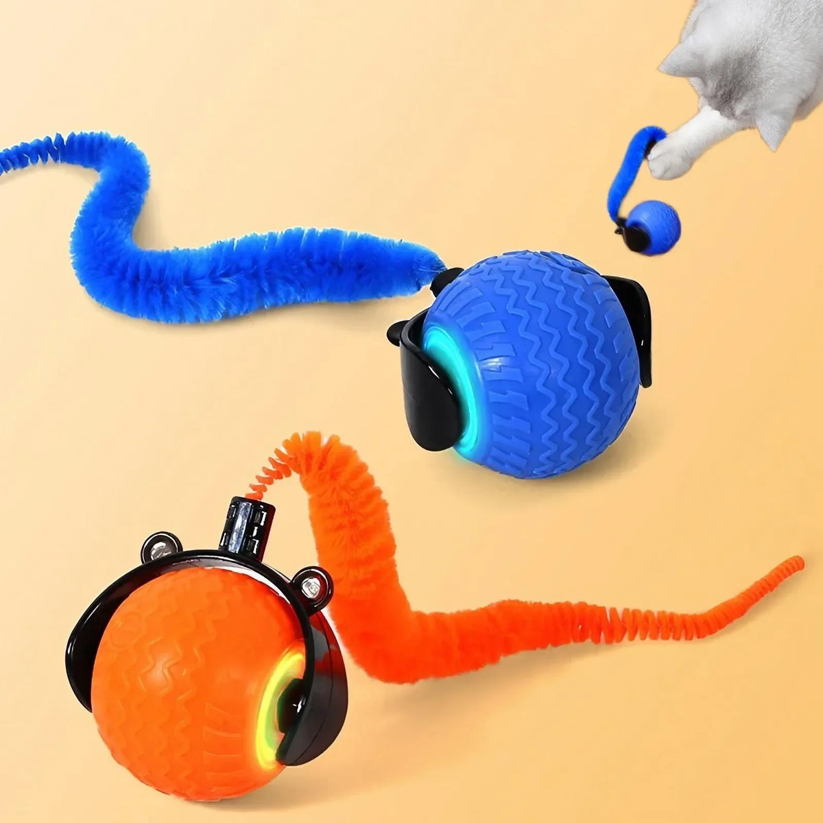 An intelligent pet ball toy for cats featuring a blue ball with a black handle and an orange ball with a black handle.