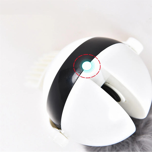 A white interactive lifting cat toy with a black rotating ball and an indicator light.