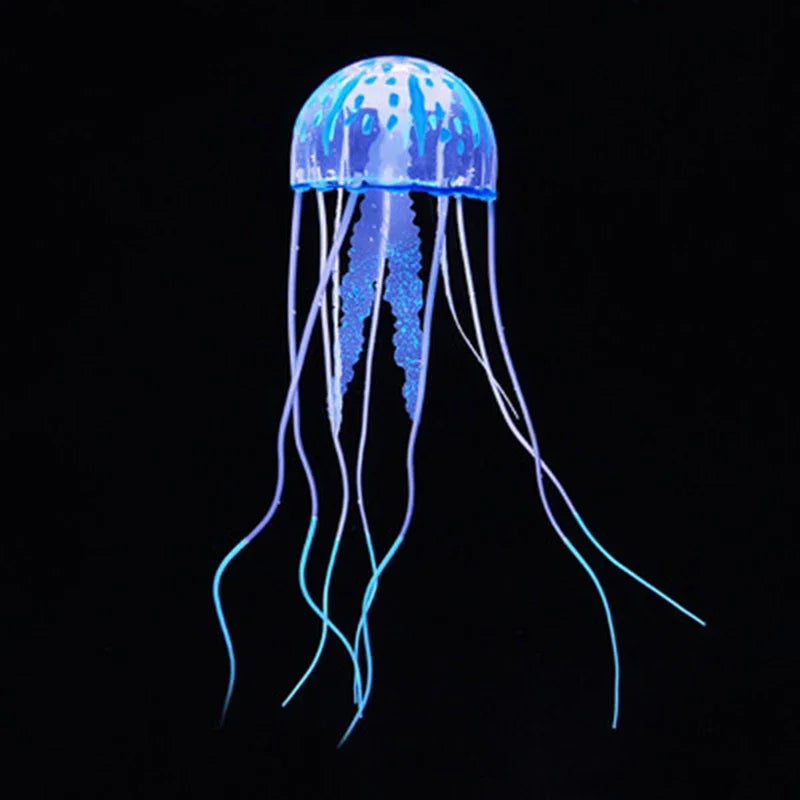 A glowing blue fluorescent jellyfish aquarium ornament with long, trailing tentacles against a black background.
