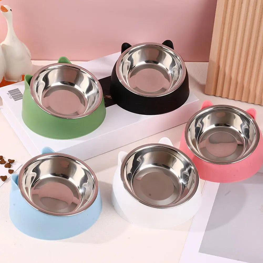 A collection of five ergonomic stainless steel pet bowls with non-slip bases in various colors like green black pink and blue
