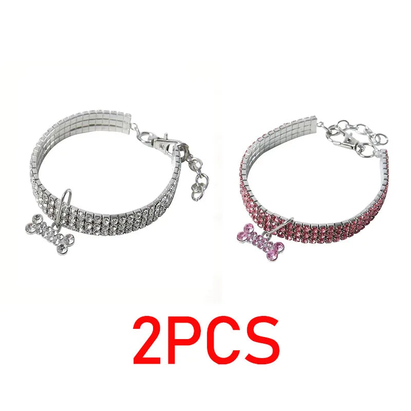 Two crystal rhinestone dog collars with quick release buckles, one silver and one pink.
